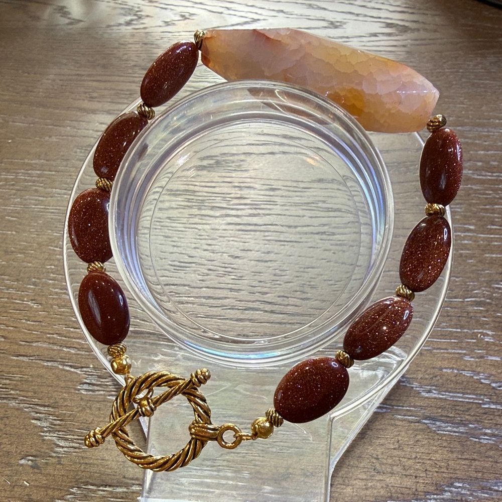 Elegant Handmade Goldstone Bracelet with Gold Accents